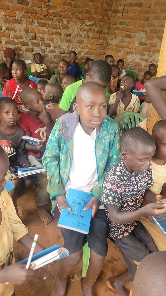 Children learning in classroom with books and educational materials
